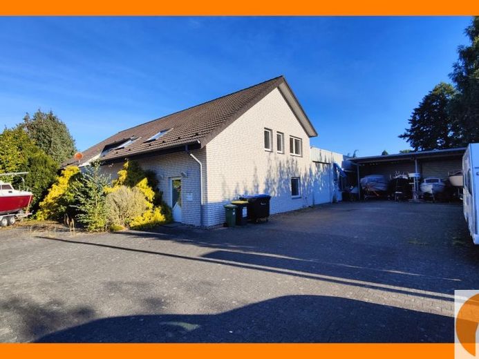 EFH-ZFH mit Gewerbe -/ Lagerhalle Nahe BAB33 in Steinhagen – Foto 1