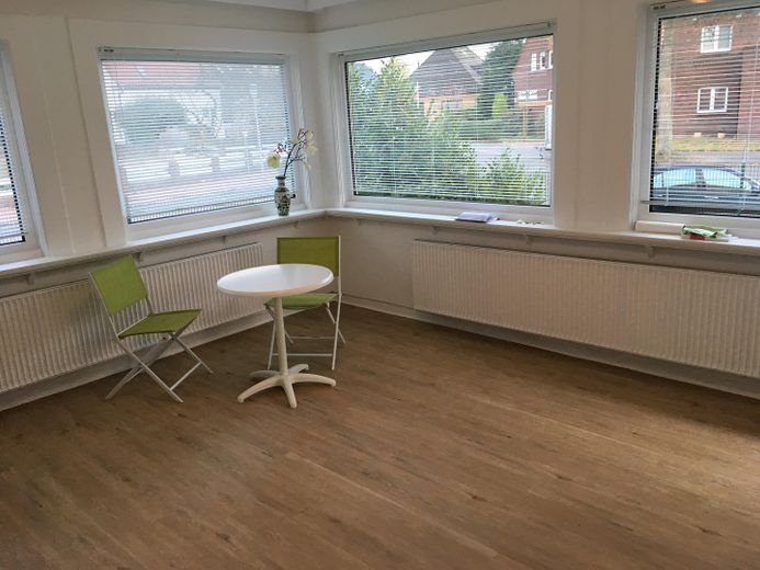 Erdgeschosswohnung in schmucker Stadtvilla – Zusatzraum