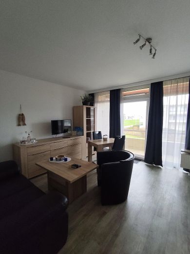 Gleich hinter dem Deich am neuen Dünenpark, 1 Zimmerwohnung – Wohn- Essbereich
