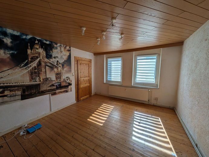 Löhne-Gohfeld — bezugsfreies Anlageobjekt mit Entwicklungspotenzial – EG Wohnzimmer