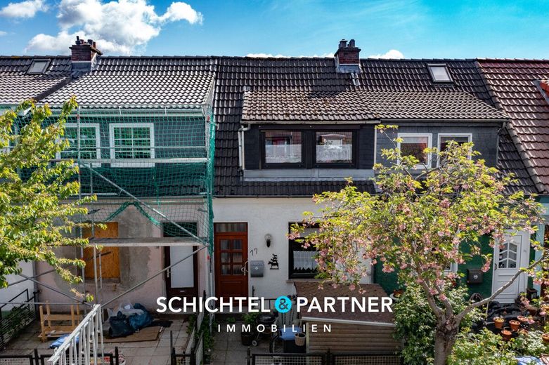 Hastedt | Vermietetes Reihenmittelhaus im beliebten "Klein Mexico" – S&amp;P | Titelbild