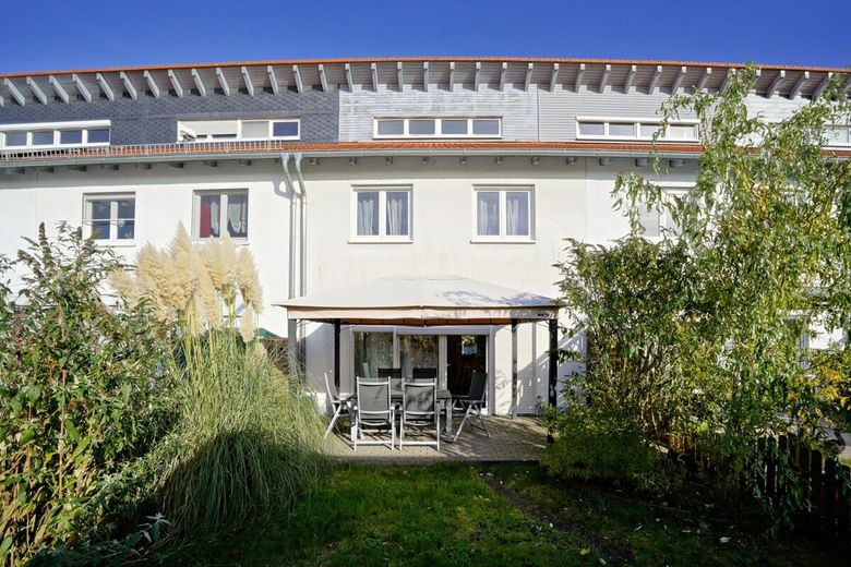 Sofort verfügbar: Gut geschnittenes Reihenmittelhaus in Langenhagen - Kaltenweide zu verkaufen! – Rückansicht