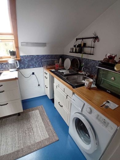 Gemütliche Dachgeschosswohnung mit Seesicht – ...mit Platz für Ihre Waschmschine
