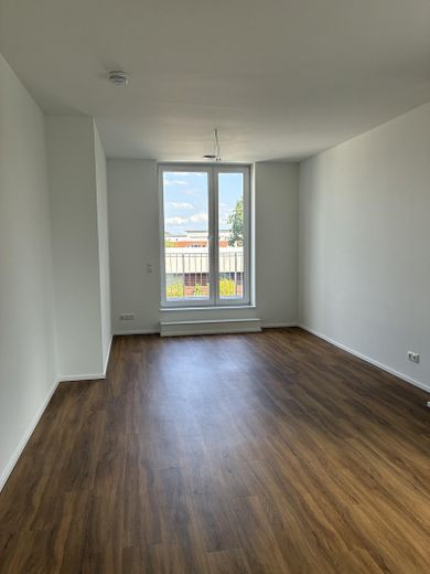 Charmante Wohnung im Staffelgeschoss – Wohnzimmer