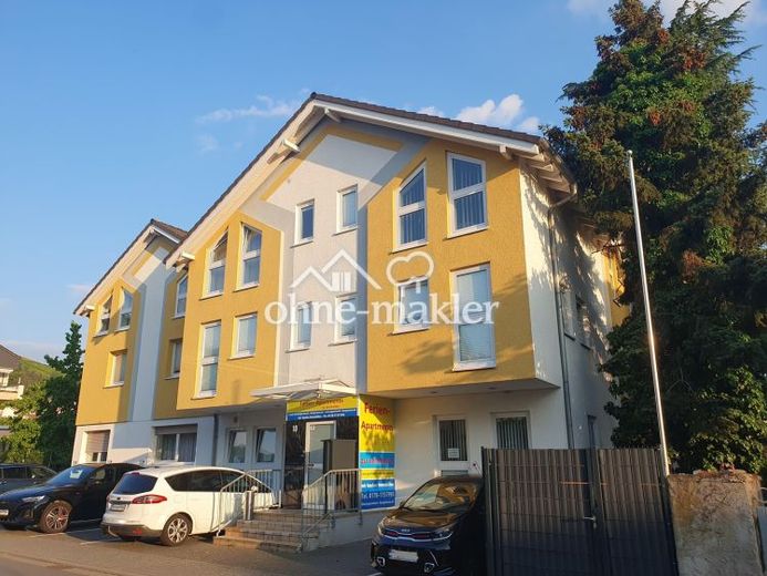 Bestehendes Apartmenthaus mit Baugenehmigung für ein 6-Familienhaus an der Bergstraße – Photo 1