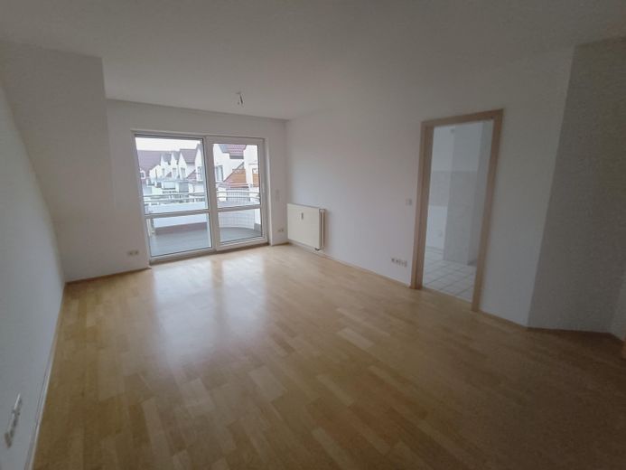 Wohnzimmer mit Balkon