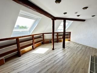 3-Raum DG Wohnung mit Balkon – offenes Wohnzimmer
