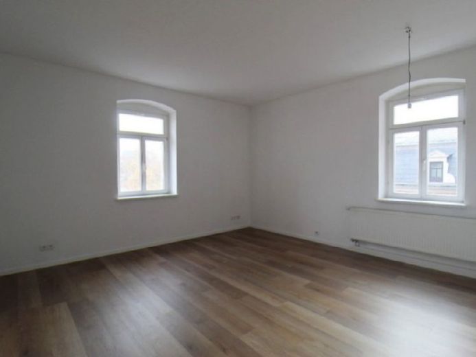 Schicke Dachgeschosswohnung mit Blick über die Stadt – Foto 1