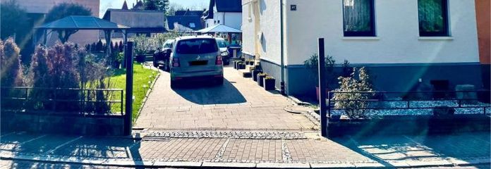 CHARMING SEMI-DETACHED HOUSE IN BÜHL: Cozy layout, garden and shed in a preferred residential location