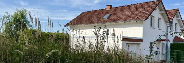 Fröndenberg: Gepflegte Doppelhaushälfte mit Garage in familienfreundlicher und stadtnaher Wohnlage!