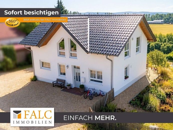 Ein Zuhause mit Weitblick – Einfamilienhaus mit großem Garten und traumhafter Aussicht – Foto 1