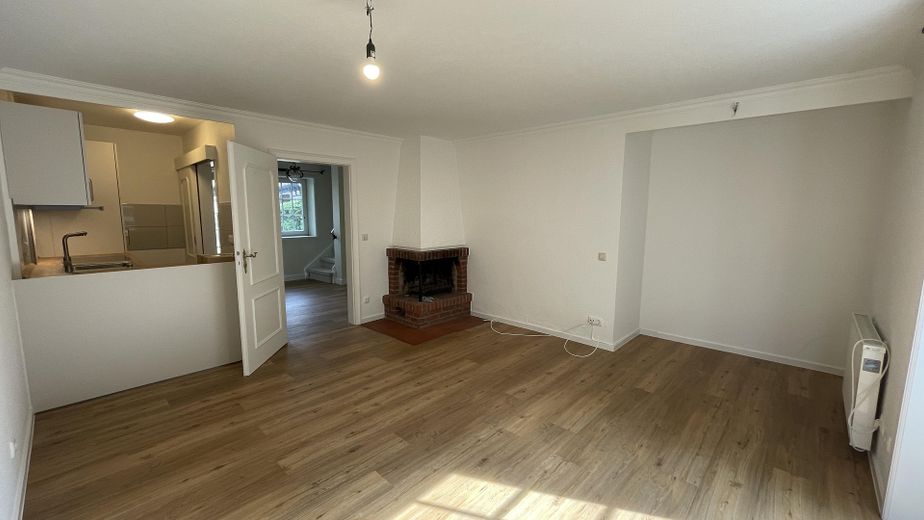 Landhaus auf dem Strampenhof im Zentrum von Bad Bevensen – Wohnzimmer mit Kamin