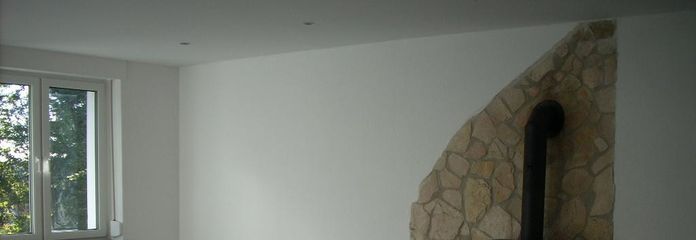 Première occupation - Appartement de 4 pièces rénové au rez-de-chaussée à Obersprockhövel – Wohnzimmer mit Kamin