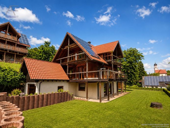 Fernblick statt Standard - Einfamilienhaus mit Potenzial in traumhafter Hanglage – Außenansicht_links