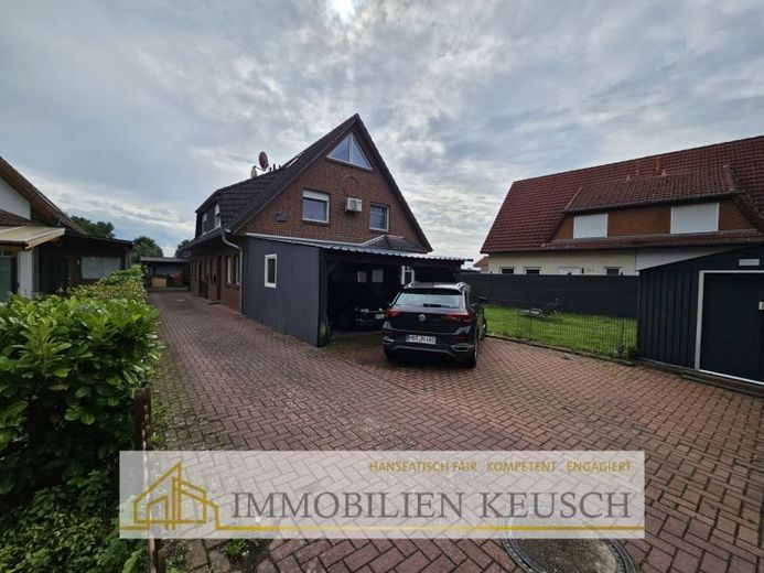 Viel Platz zum kleinen Preis – DHH über drei Etagen mit Whirlpool & überdachter Terrasse – Foto 1