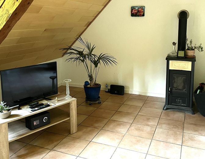 Wohnzimmer mit Ofen OG