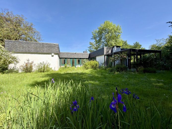 Absolute Rarität: Bungalow in Schildgen mit 6.612 m² Grundstück in direkter Waldrandlage – Blick Gartenseite