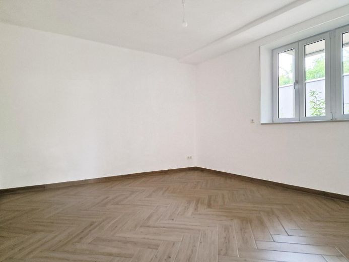 EG Wohnung mit Terrasse | NACHHALTIGSTE Immobilie Wolfsburgs, Lehmbau, PV - Autarkie, Appsteuerung – Zimmer 1