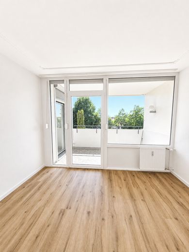 Schlafzimmer mit Balkonzugang