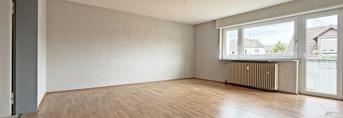 ¡Su proyecto de renovación en Friesenheim: 3 habitaciones con balcón en una ubicación tranquila! – Wohnzimmer