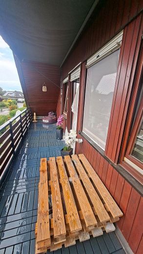 Two-family house – quiet and central with a garden paradise – OG Loggia