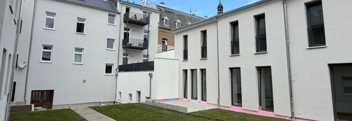 Historischer Charme trifft modernen Wohnkomfort – Dachgeschosswohnung mit Balkon