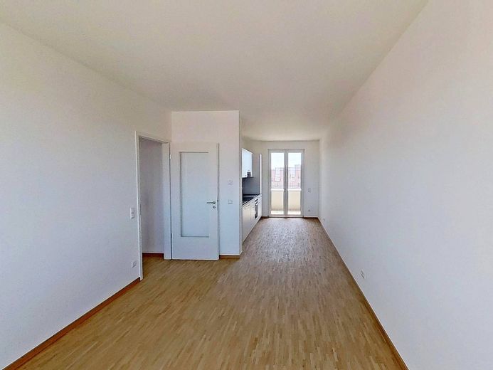 Vivienda moderna en Kronsrode: piso de 4 habitaciones con COCINA EQUIPADA, BALCÓN y LOGIA – Ansicht I: Wohn- und Esszimme…