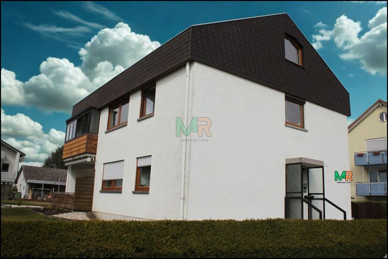 Vermietetes MFH mit Nebengelass und großem Grundstück! – Haus Seitenansicht
