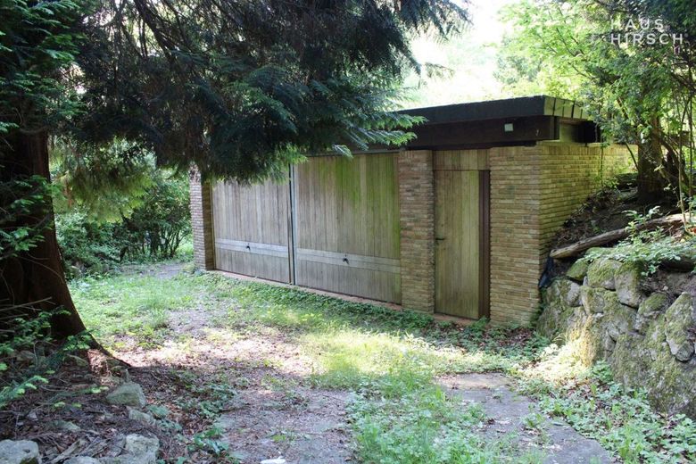 Eine außergewöhnliche Immobilie für außergewöhnliche Menschen – Doppelgarage  außen