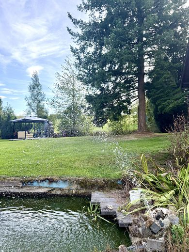 Vielseitiges Wohn- und Gewerbeobjekt mit Hallen & Werkstatt in naturnaher Lage – Garten