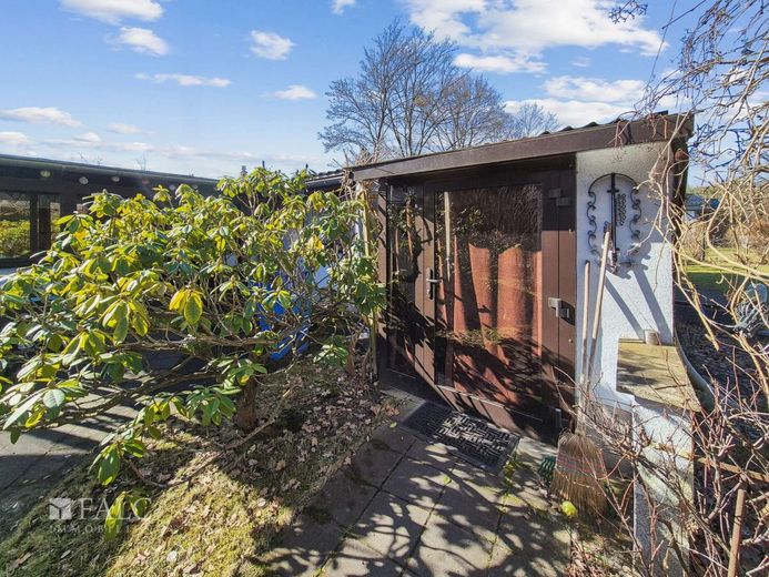 Jetzt oder Nie: Das Haus am See - FALC Immobilien – Nebeneingang