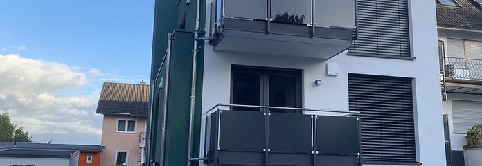 Drempelvrije 2-kamerwoning met lift (KfW 55) – Haus Rückseite