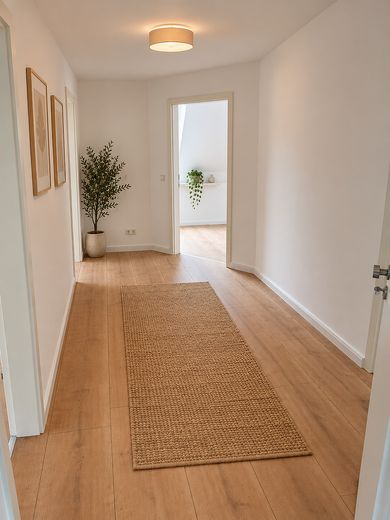 Schledehausen-3-Zimmer Dachgeschosswohnung 2.OG – Eingangsbereich
