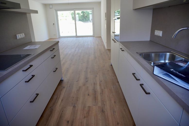 3-Zimmer Terrassenwohnung auf dem Gütlbauerhof – Küche & Wohnen