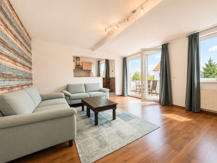 Wohnungspaket mit ca. 5,16 % Bruttorendite, Stellplätzen und Ausbaureserve in Schwarzenbek – Wohnzimmer