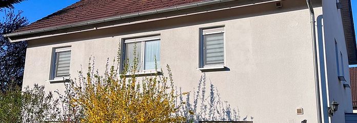 Traumhaftes Wohnen auf 2 Etagen - Haus in Haus mit Garten und Weitblick