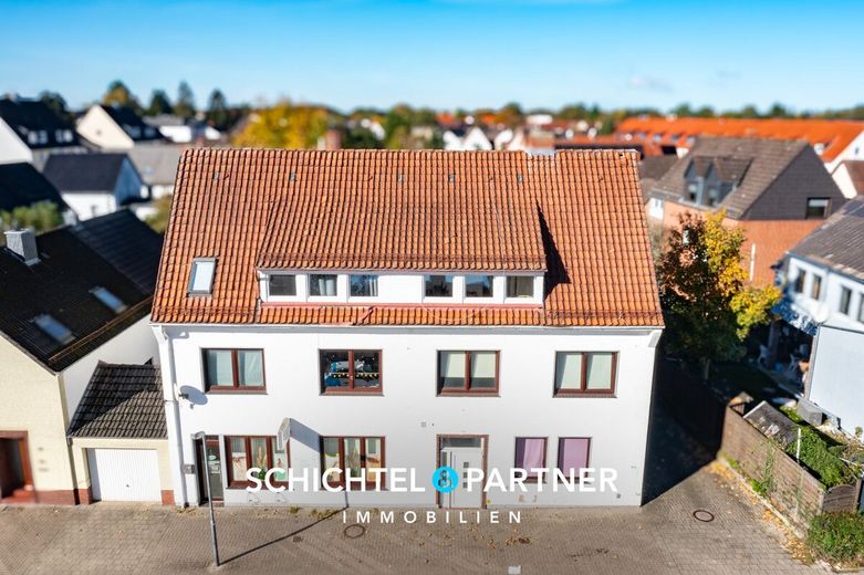 Vegesack | Mehrfamilienhaus mit Gewerbe, Garagen und großem Grundstück – S&amp;P | Titelbild