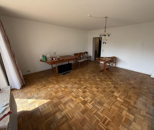 Investissement immobilier à Hambourg-Hummelsbüttel | Appartement loué de 2,5 pièces avec contrat de location indexé – Wohnzimmer