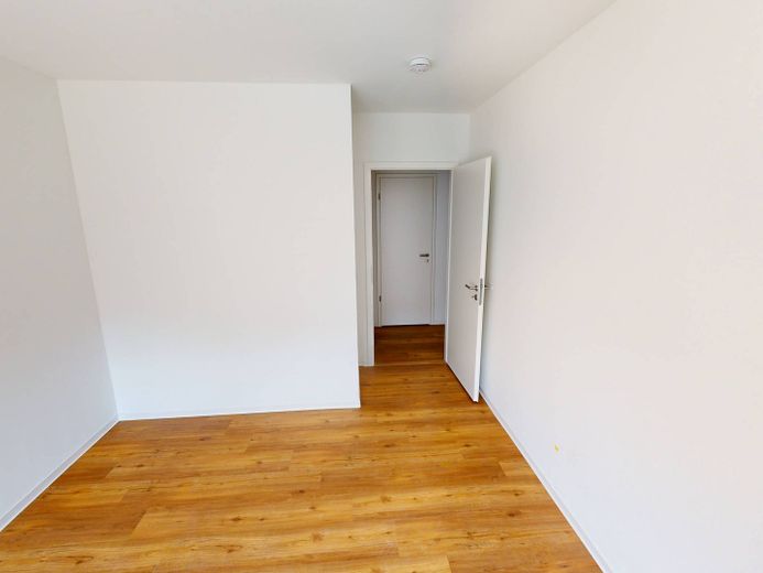 Moderne 2-Zimmer-Wohnung mit EBK und BALKON im Neubauquartier FIELD 4 – Ansicht II: Schlafzimmer