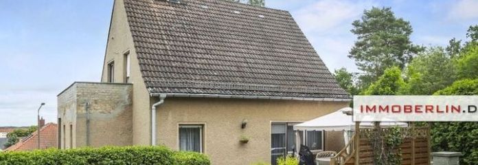 IMMOBERLIN.DE - Angenehmes Einfamilienhaus mit Westgarten & Garage in familiärer Lage