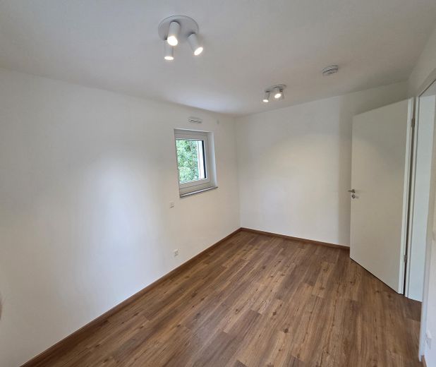 Neubau - Erstbezug - sofort verfügbar! Exklusive 2-Zi-Wohnung mit EBK und Garten sowie Tiefgarage – Schlafzimmer