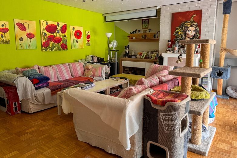 Wohnen auf einer Ebene - Bungalow mit 3 Zimmern, Carport sowie Garage und großen Garten in Garlstedt – Wohnzimmer
