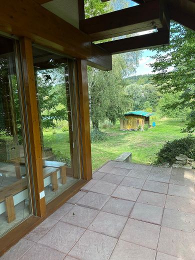 Einzigartiges Holzhaus im Grünen in Randlage und doch zentral – Foto 5