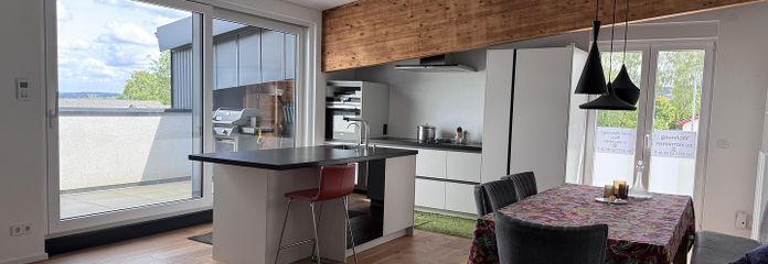 Exklusives Loft-Apartment mit Designküche, Klimaanlage, 2 Balkonen & Garage – 110 qm Wohnkomfort