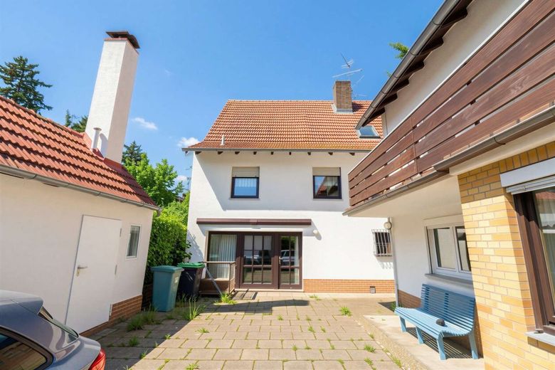 WRS Immobilien - Langenselbold - ruhige + grüne Innenstadtlage - Abrissgrundstück für MFH + DHH  + RH – Außenansicht - Rückgebäude