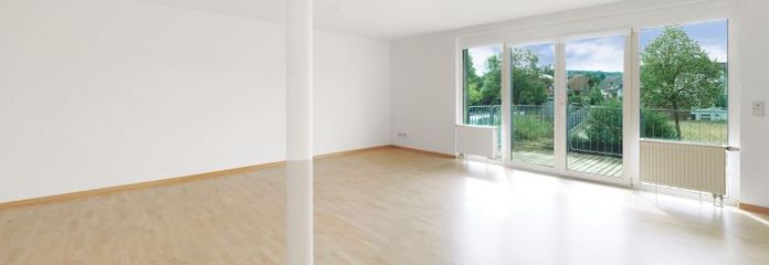 Sonnige 3-Zimmer-Wohnung mit Gartenanteil, Südostbalkon und Carport