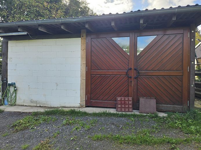 Alpaka çiftliği – Eingang linker Stall