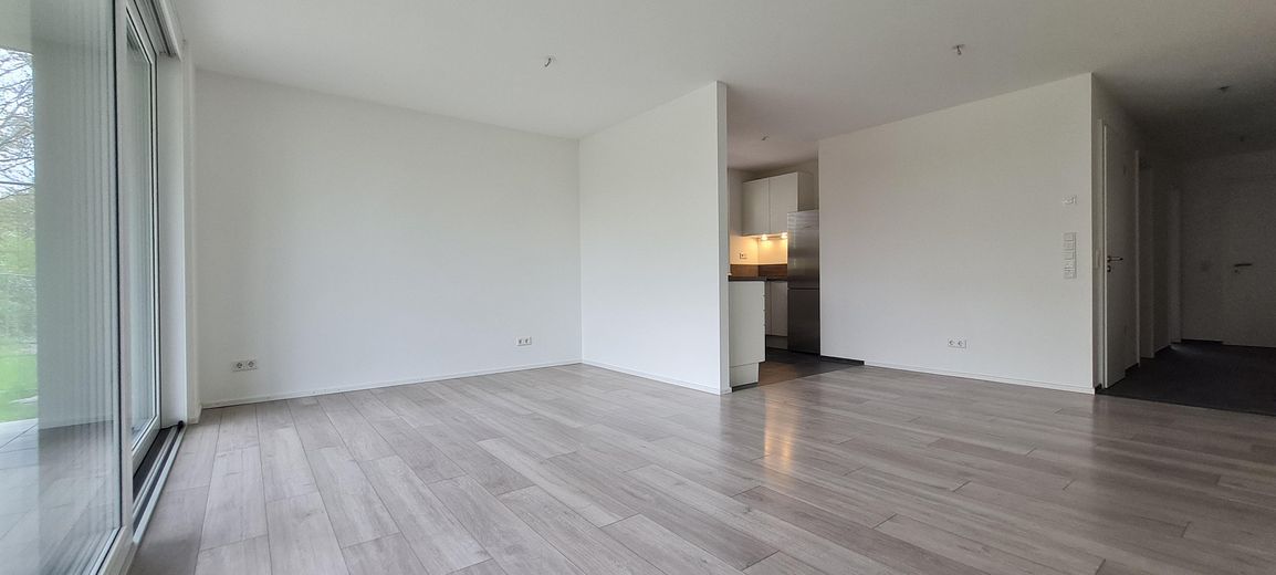 moderne 3,5 Zimmerwohnung 1.OG mit Lift, EBK und überdachtem Balkon – Wohnzimmer Bsp. EG Wohnung