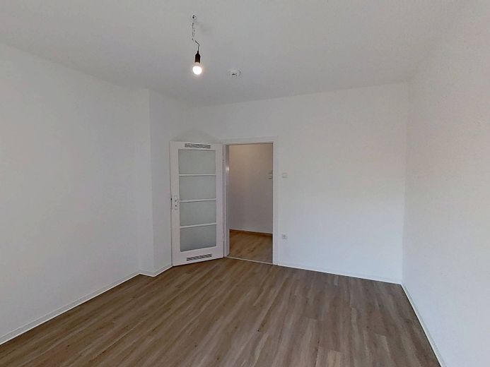 Bielefeld-Mitte’de geniş oturma mutfağına sahip ferah 2 odalı daire – Ansicht II: Wohnzimmer