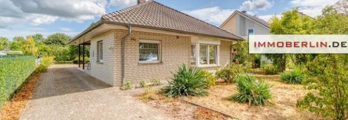IMMOBERLIN.DE - Wunderbarer Bungalow mit Südterrasse & Garage in familienfreundlicher Lage